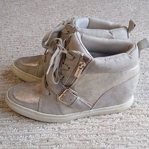 High top wedge sole tennis shoe